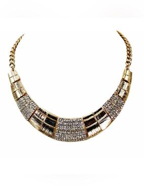 Wide metal statement necklace with crystals and textured metal sections New